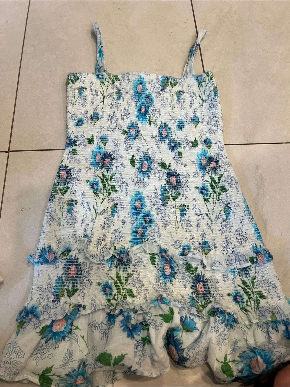 LoveShackFancy light blue knit top with pastel accents